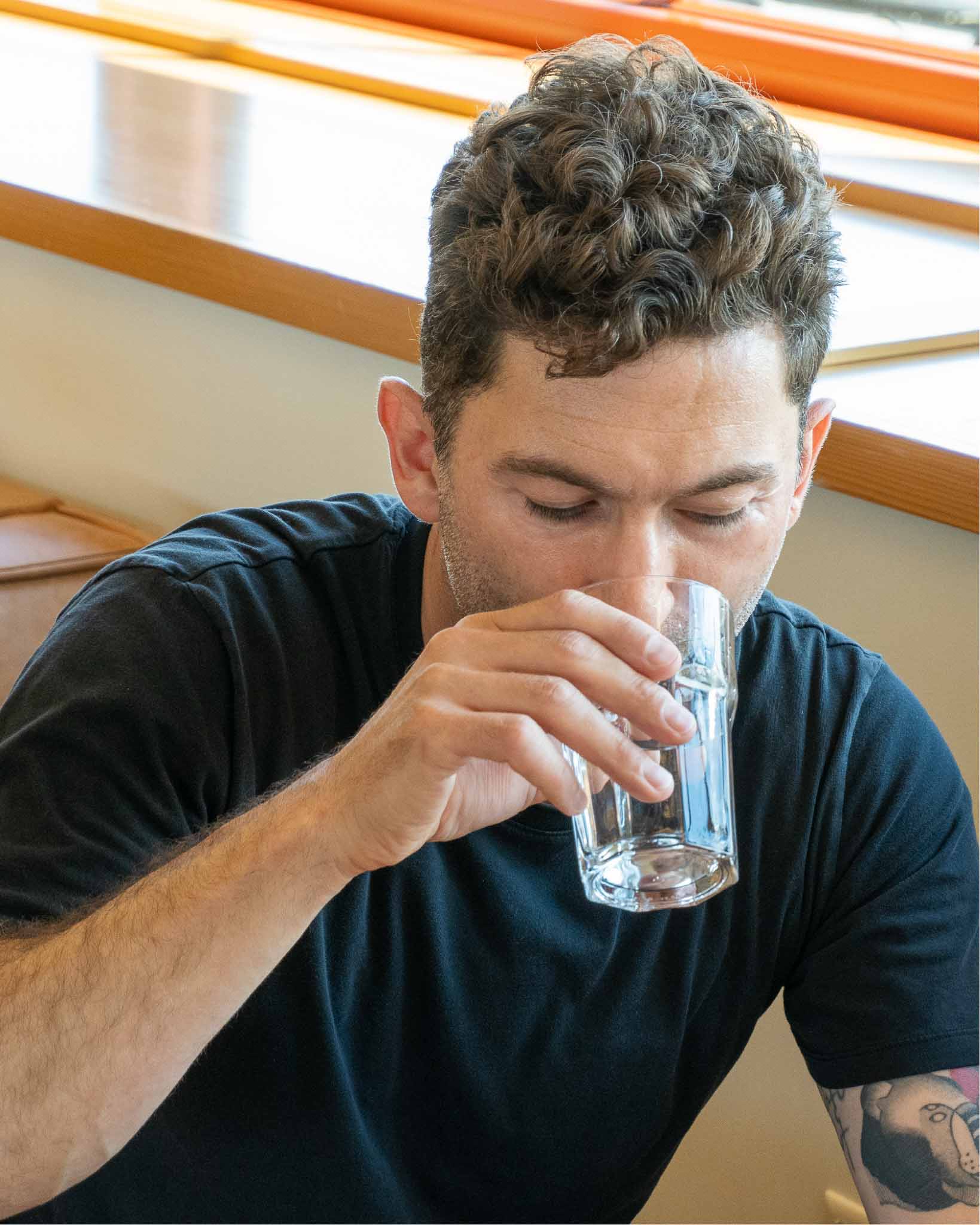 Taking capsules with water