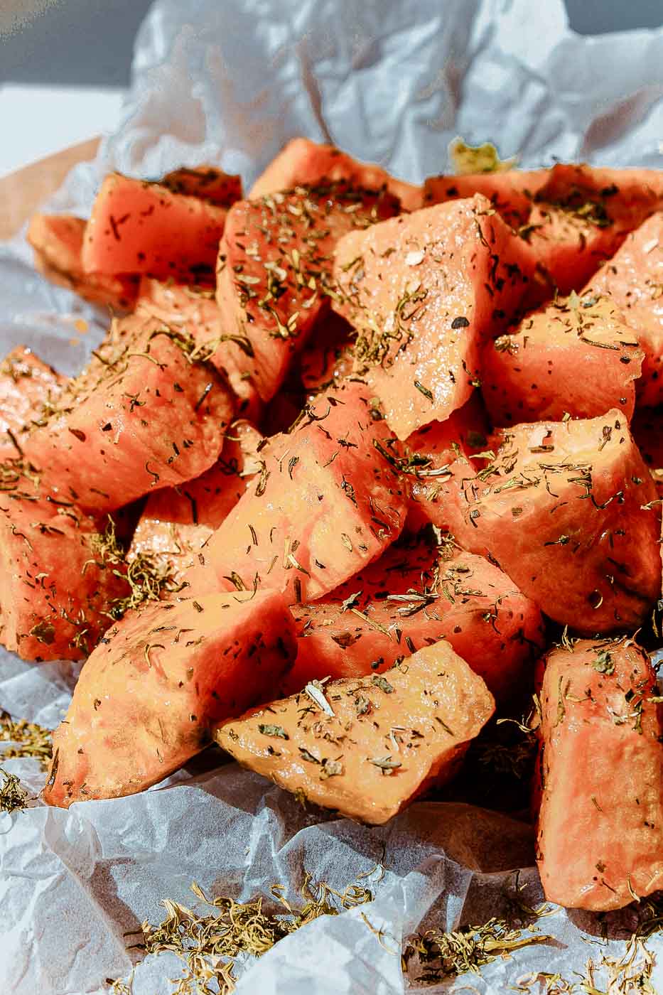 Roasted sweet potatoes seasoned with herbs, a warming winter food used in Chinese Dietary Therapy to support digestion and conserve Qi